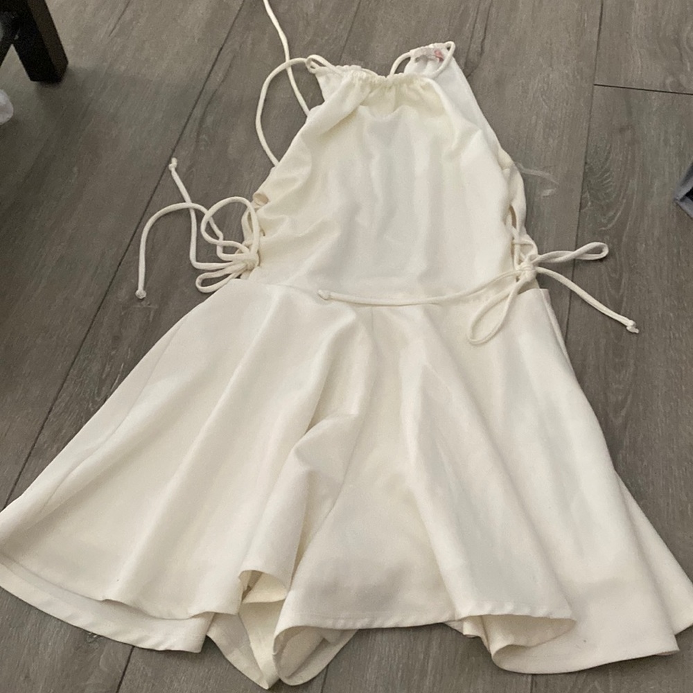White romper with tie ups